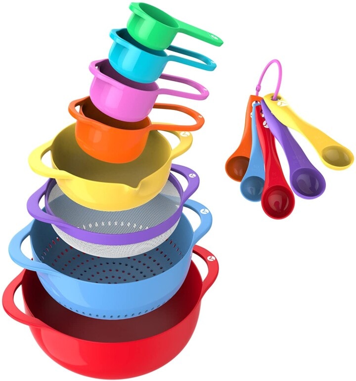 Colorful stacking bowls and measuring cups for kids.