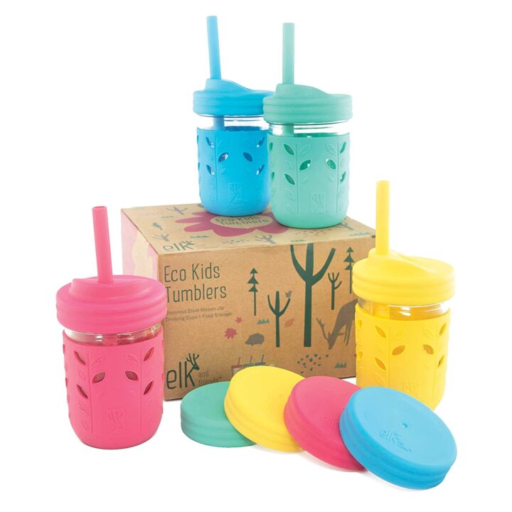 Brown box with fun kid friendly print with 4 colorful cups with lids and straws for kids and toddlers.