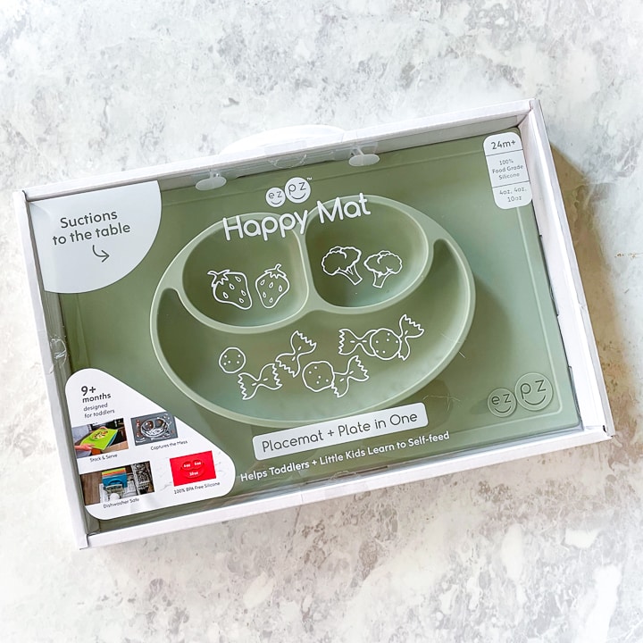 Box with happy mat inside.