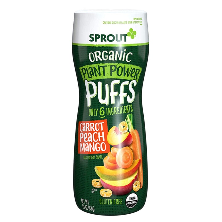 Green plastic tube filled with plant power puffs.