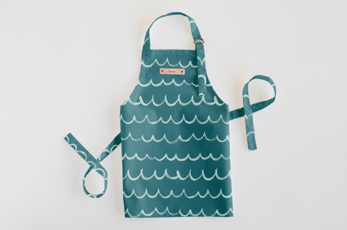 green waves apron with name plate.