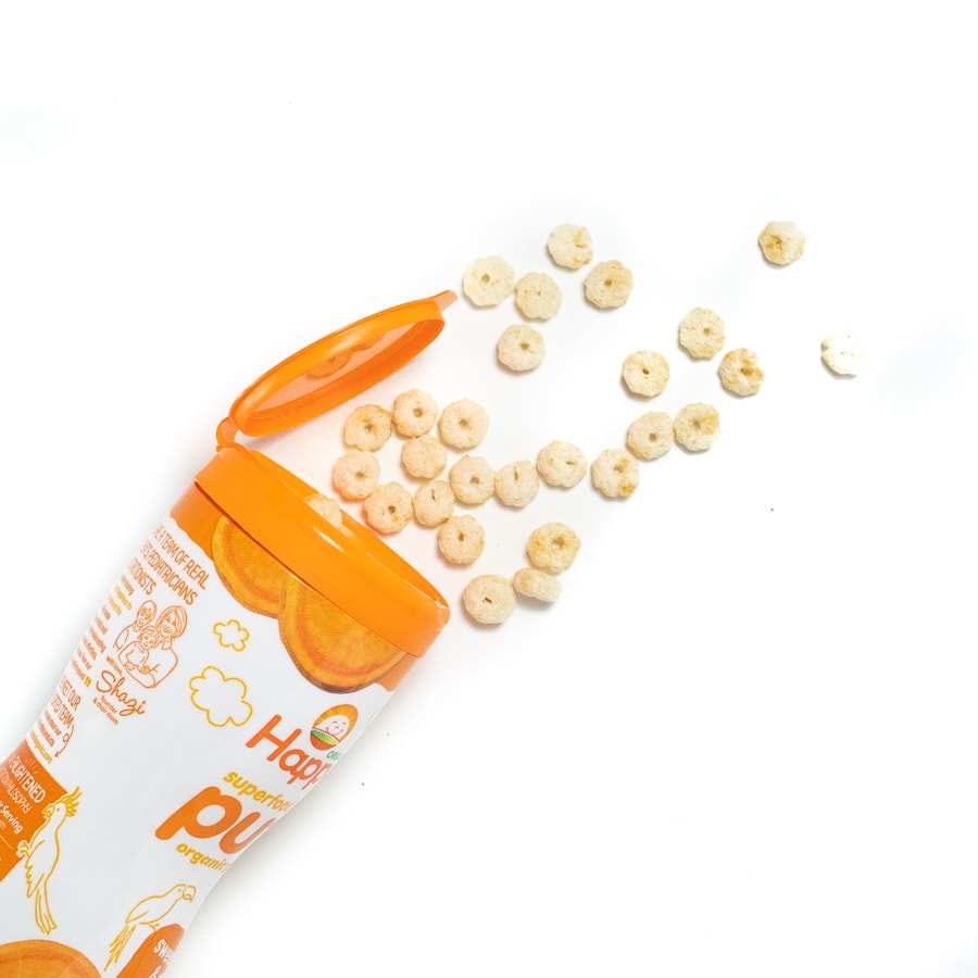 Can of puffs open on a counter with puffs spilling out on a white counter.