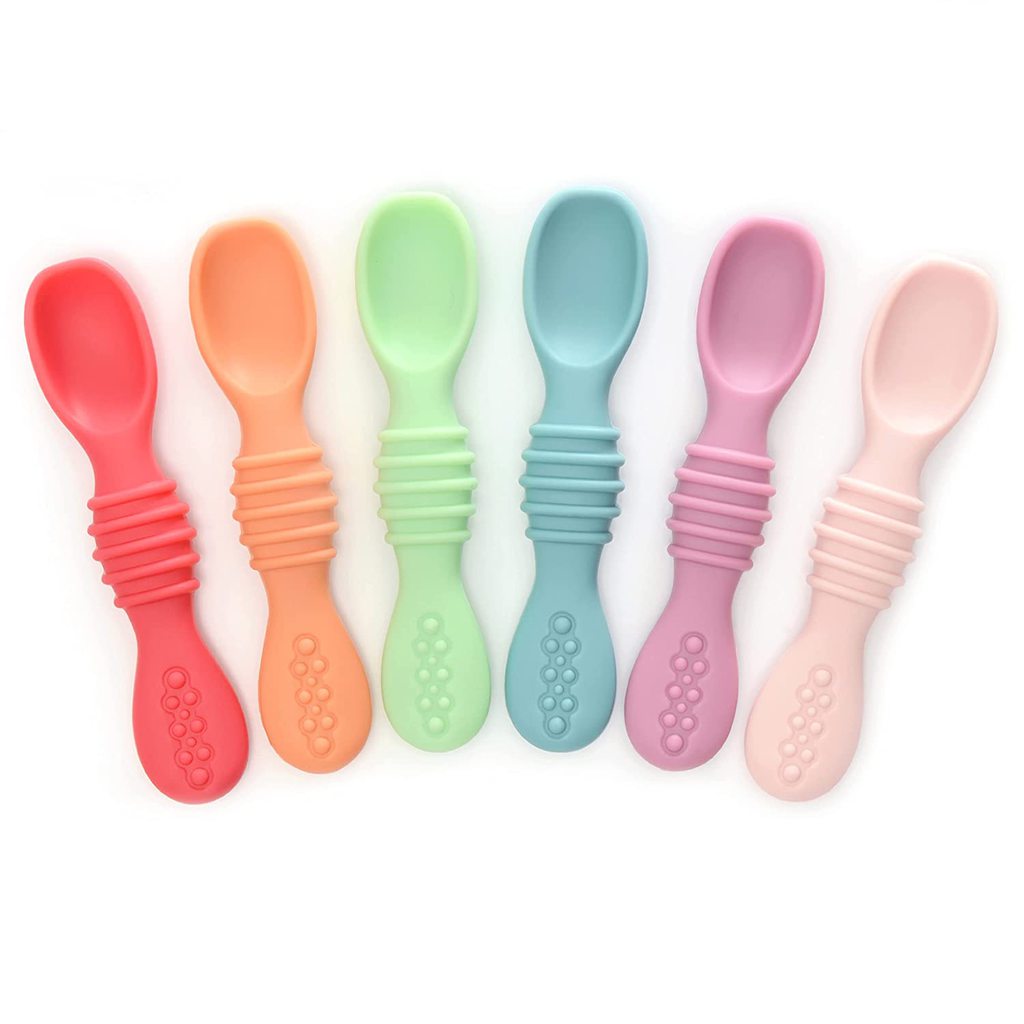 6 silicone baby spoons in a rainbow color.