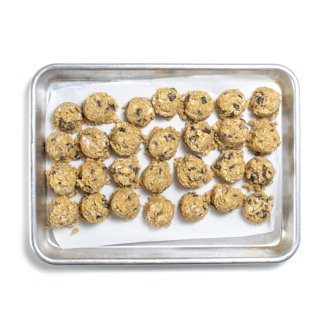 A baking sheet of frozen cookie dough