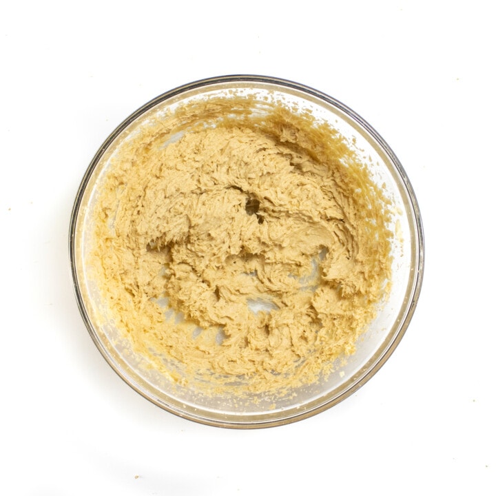 A mixing bowl with whipped butter and sugar.