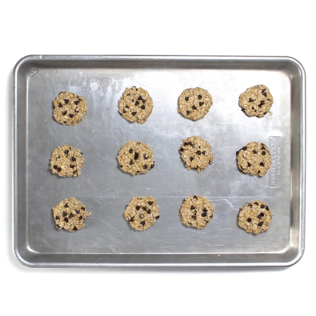 Baking sheet of banana oatmeal cookies ready to be baked.