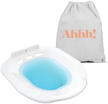 white sitz bath with a bag that says 'ahhh' in peach on it.