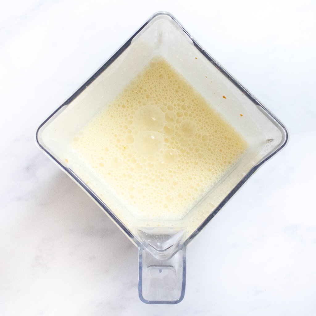 A blender full of orange Creamsicle.