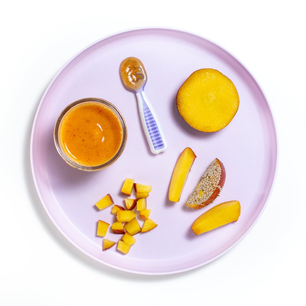 Purple kids plate with different was to serve peaches to baby.