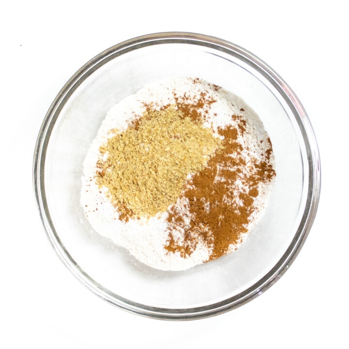 Clear glass bowl with dry ingredients for pancakes.
