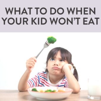 Graphic for post - what to do when your kid won't eat. Image is of a girl with a striped shirt staring at a piece of broccoli at the dinner table.